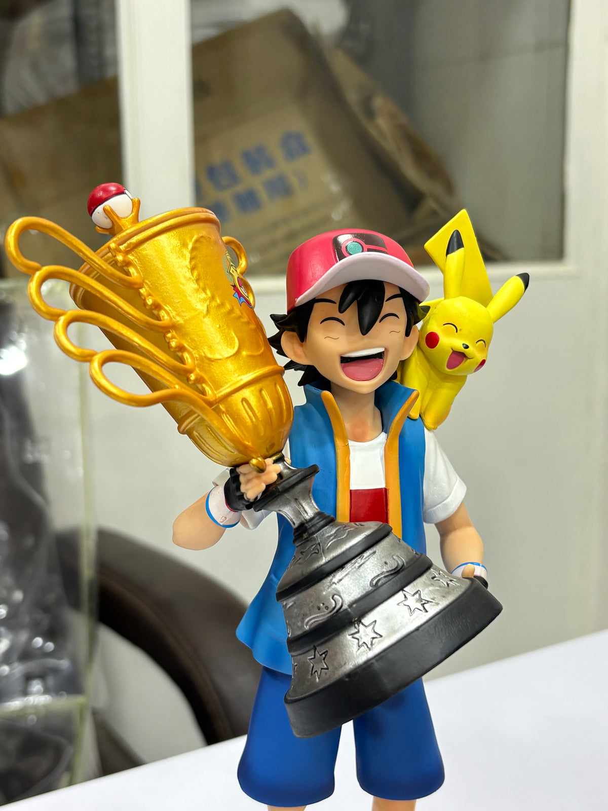 Pokémon Ash Ketchum Champion Trophy with Pikachu Collectible Figure