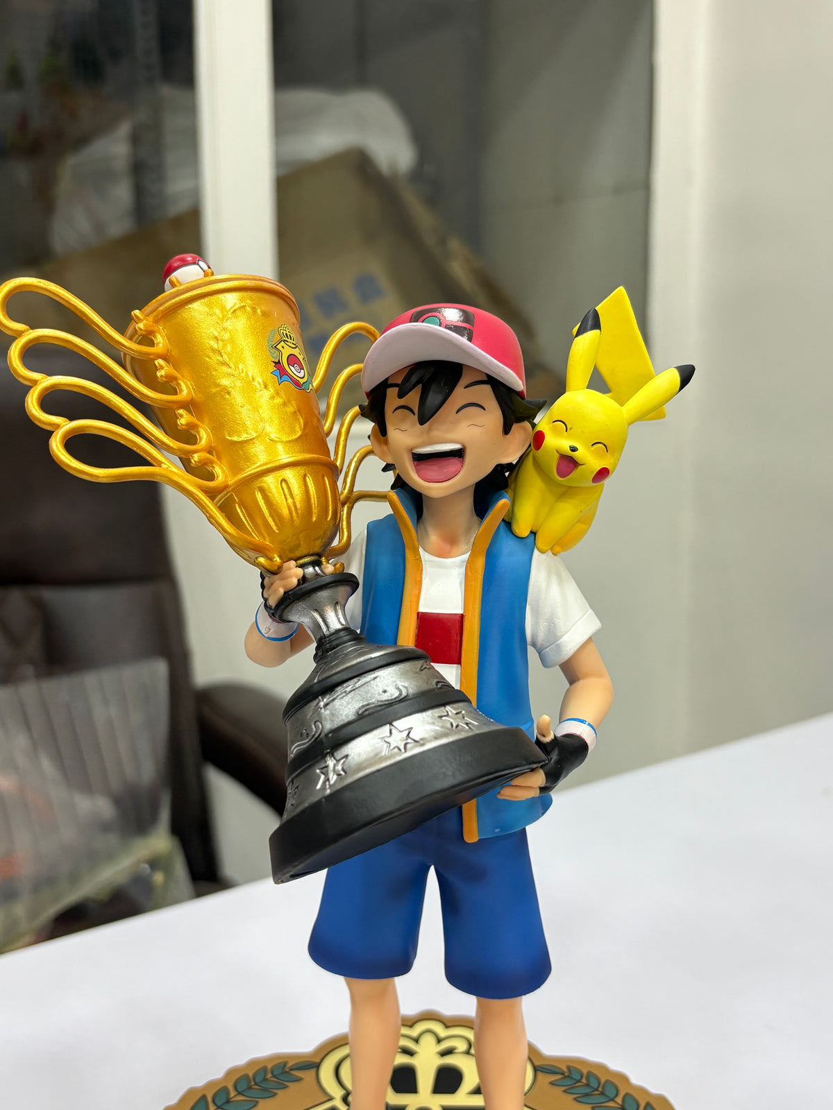 Pokémon Ash Ketchum Champion Trophy with Pikachu Collectible Figure