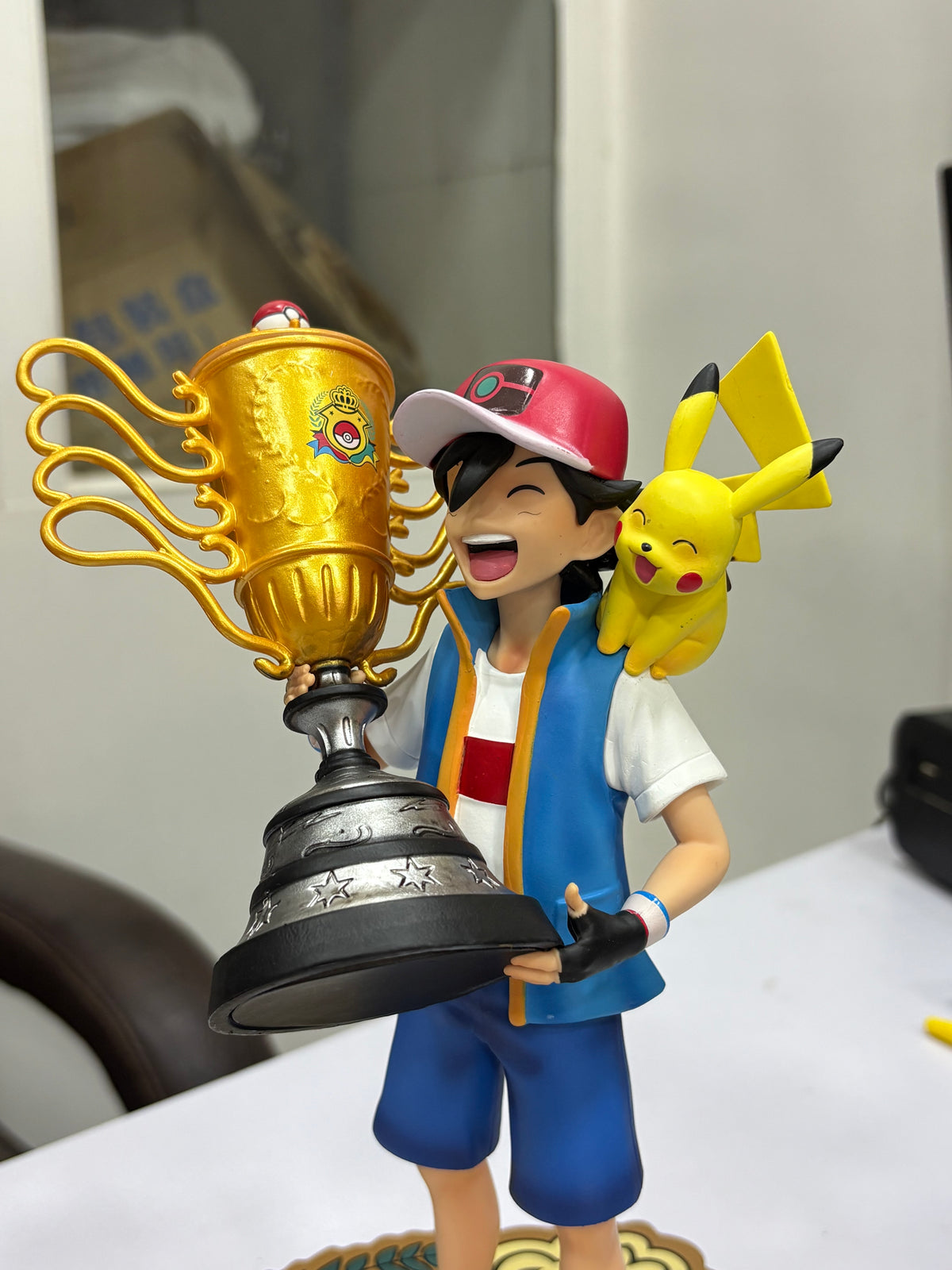 Pokémon Ash Ketchum Champion Trophy with Pikachu Collectible Figure